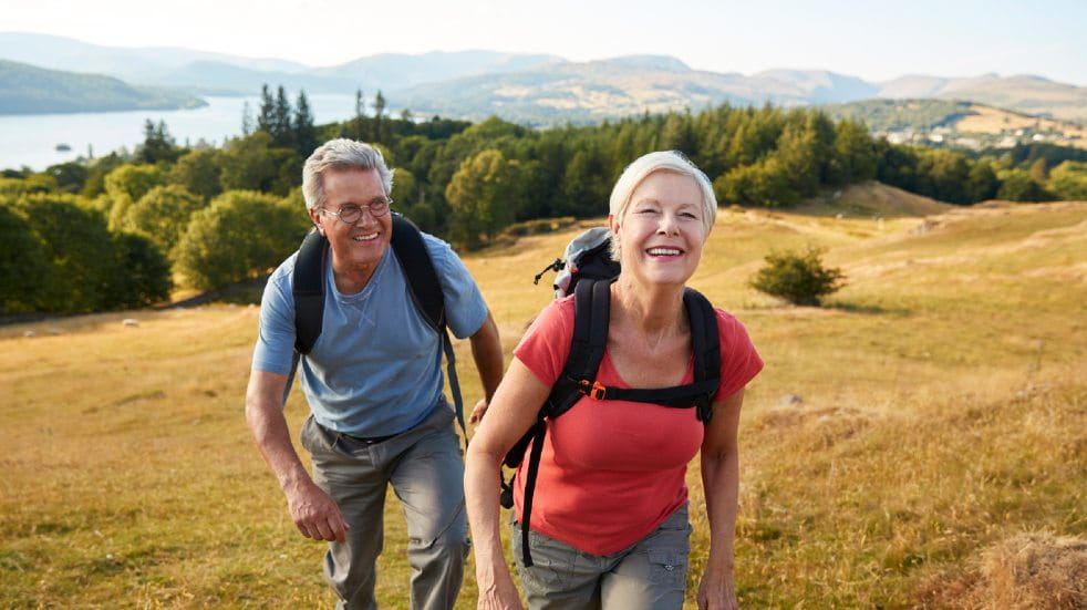 Retirement planning tips senior couple hiking